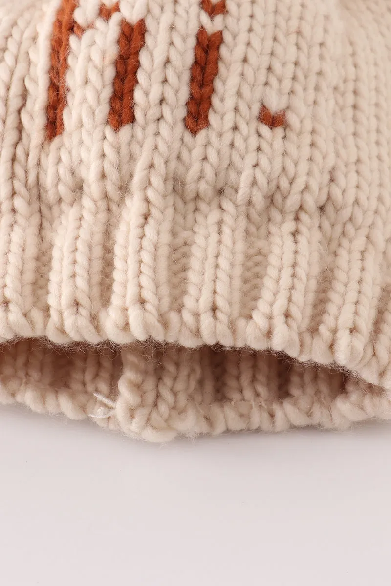 Beige pompom hi cable beanie