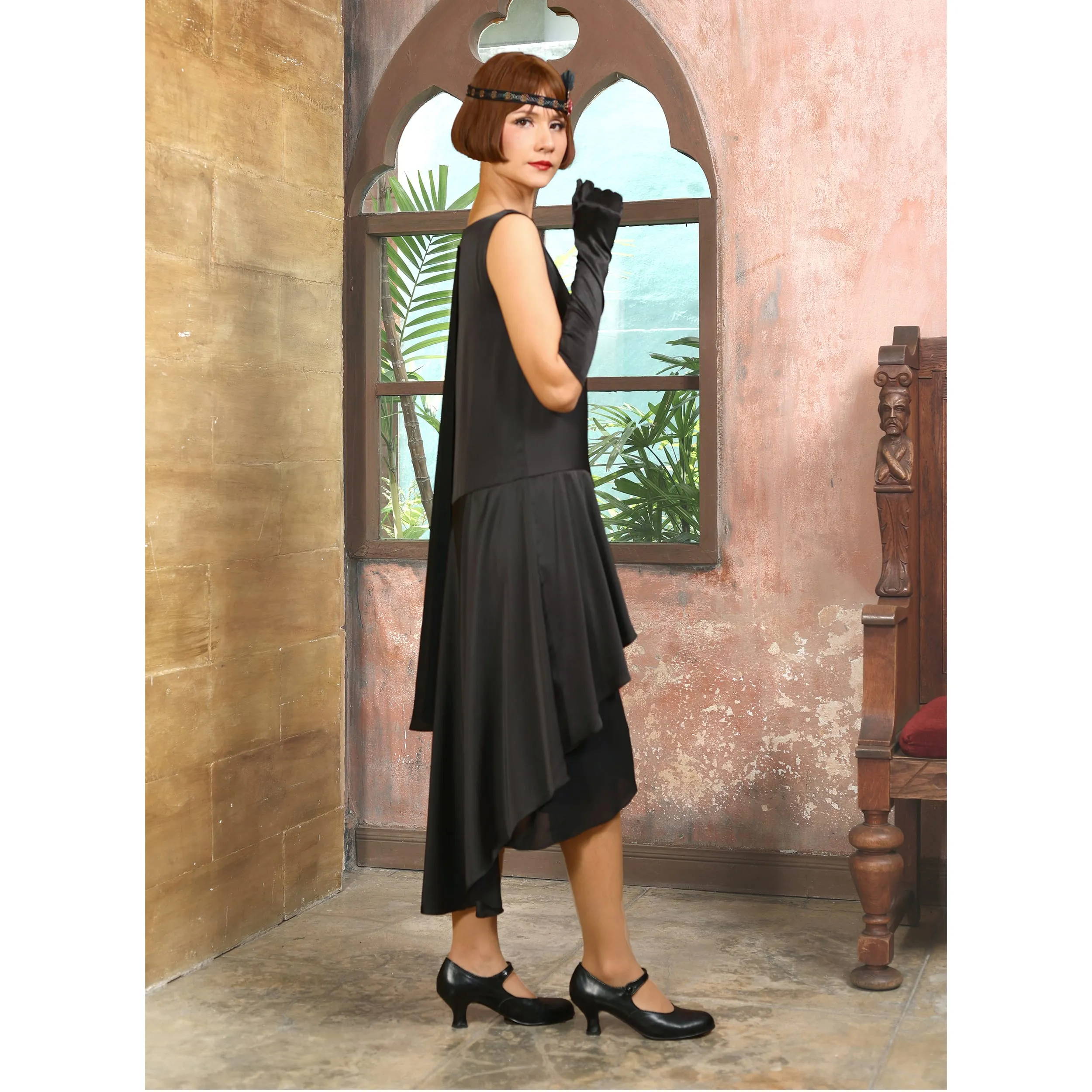 Black 1920s formal evening satin dress with a shoulder train