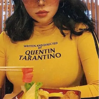 Written and directed by Quentin Tarantino turtle neck crop top